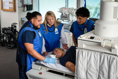 professor and students in radiography lab