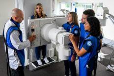 Group of radiography students in lab with professor