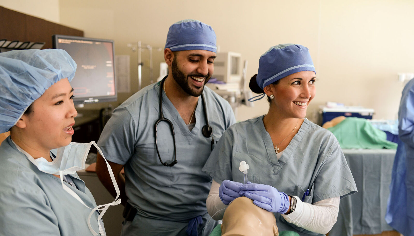 Nurse anesthesia students practicing intubation procedures in the skills lab