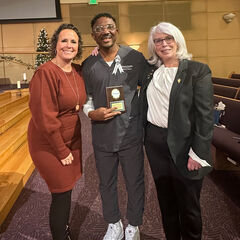 John Itoe with Nursing faculty members at the nursing pinning ceremony