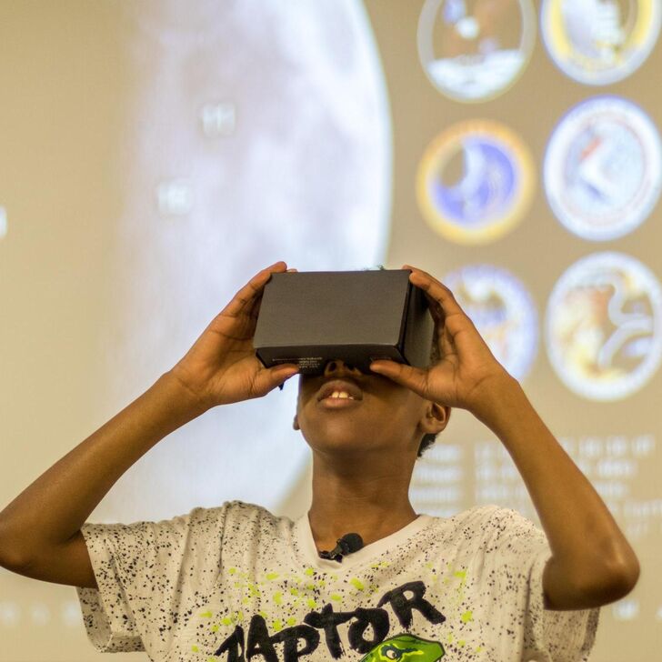 Boy using a VR headset